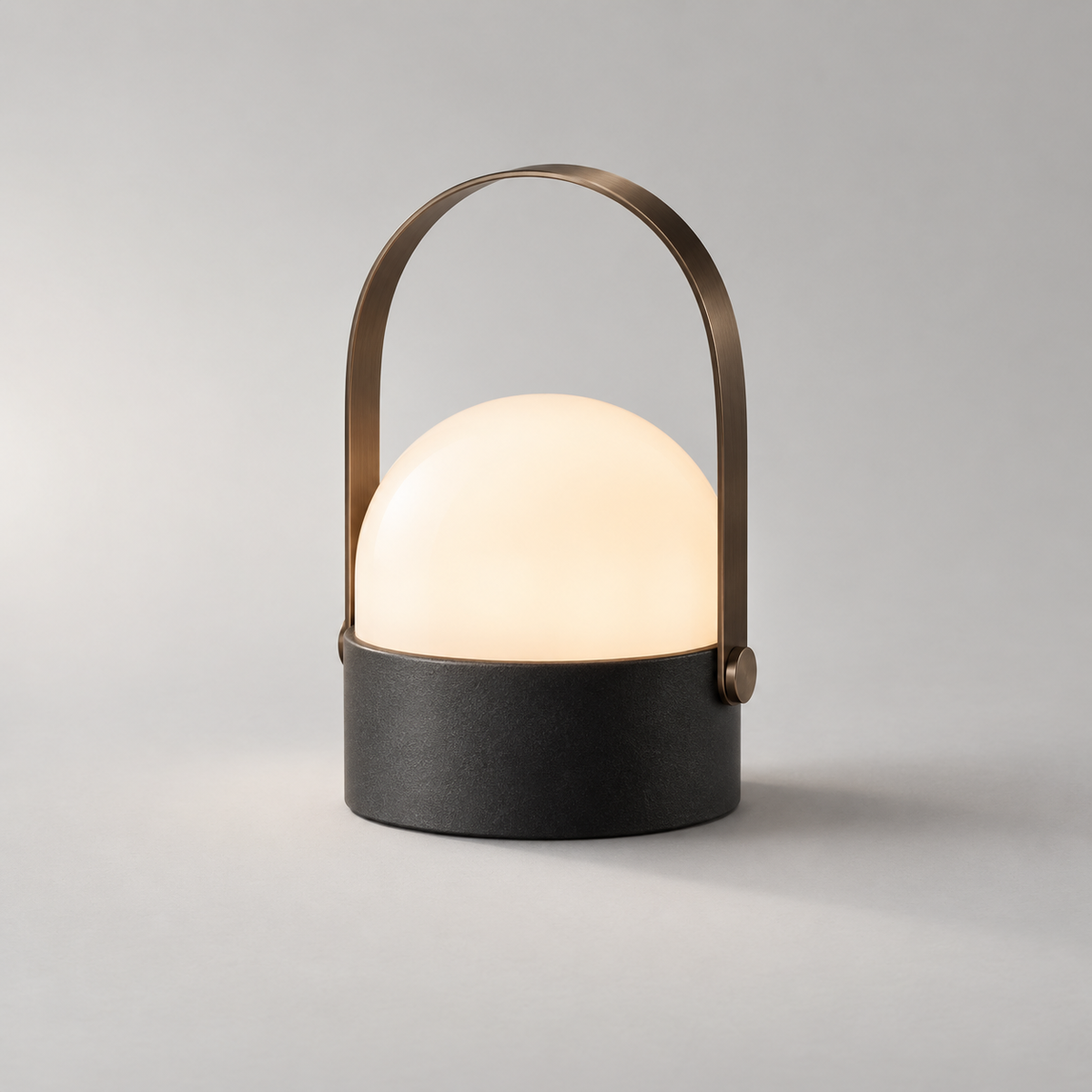 Auric Carry Lamp in a three-quarter studio view