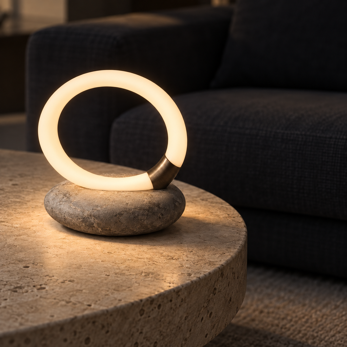 Drift Halo Lamp on a low travertine table